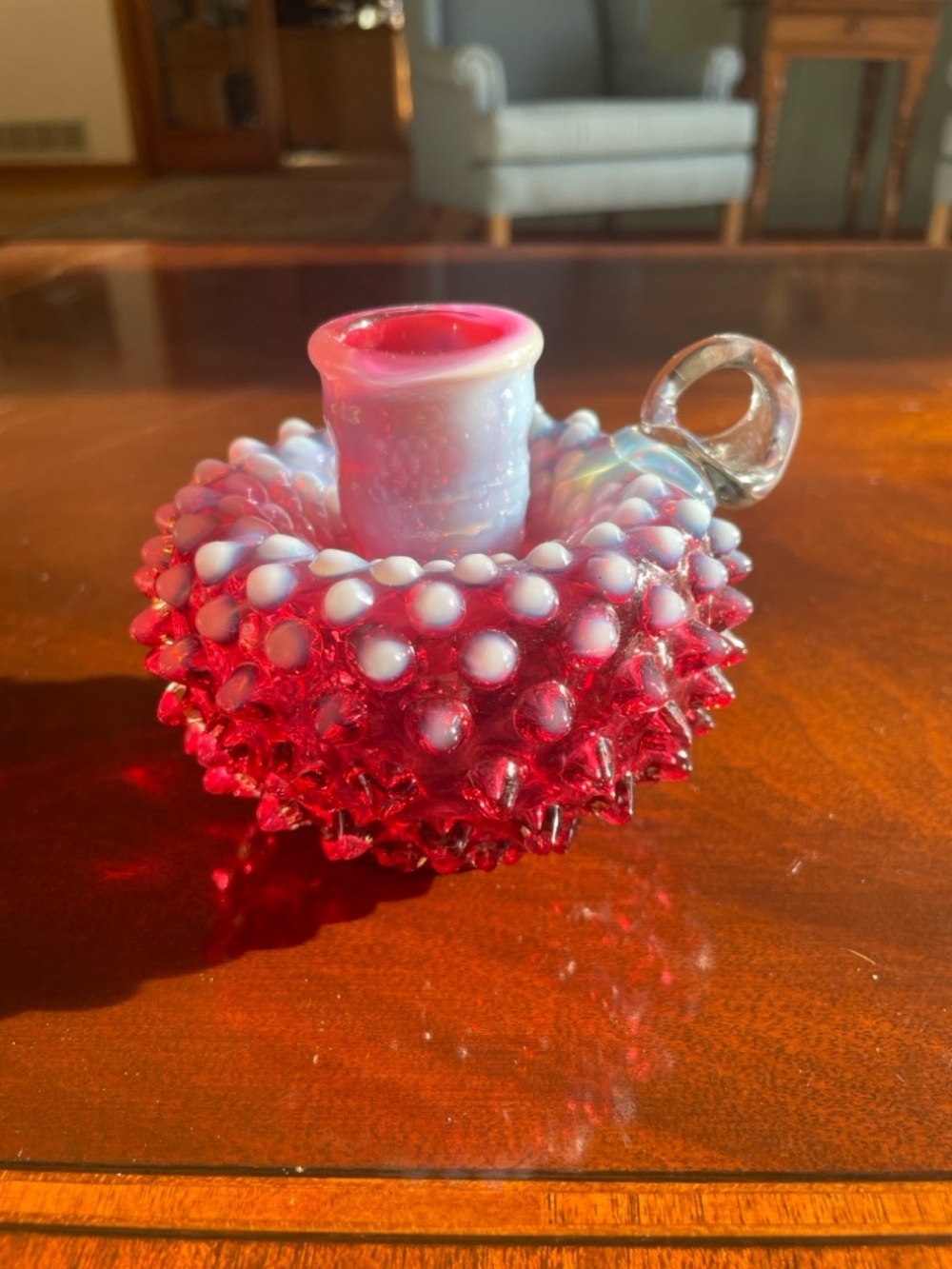 Fenton Cranberry opalescent hobnail candle holder.